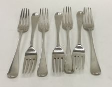 Seven Georgian OE pattern silver dessert forks. Lo