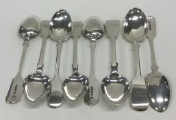 EXETER: A set of eight silver fiddle pattern teaspoons