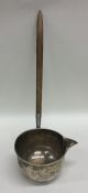 A rare silver toddy ladle with tapering handle and