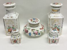 An attractive Victorian scent bottle set decorated