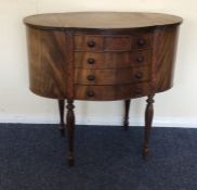 A mahogany demi lune sewing box with fitted interi