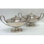 A pair of good Georgian silver sauce tureens and c