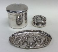 A small silver dressing table tray together with a