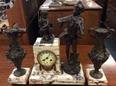 A marble and spelter mounted clock garniture decor