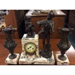 A marble and spelter mounted clock garniture decor