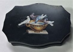 A micro-mosaic paperweight decorated with Pliny's Doves.