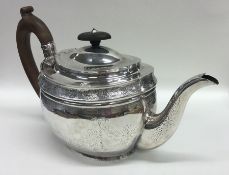 A good quality Georgian bright cut silver teapot d
