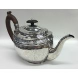 A good quality Georgian bright cut silver teapot d