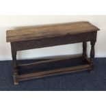 A small oak joint stool with carved front and stre