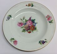 An attractive Meissen plate decorated with bright