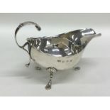 A silver sauce boat with card cut rim. Birmingham.