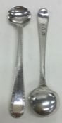 A pair of OE bead pattern silver salt spoons. Appr