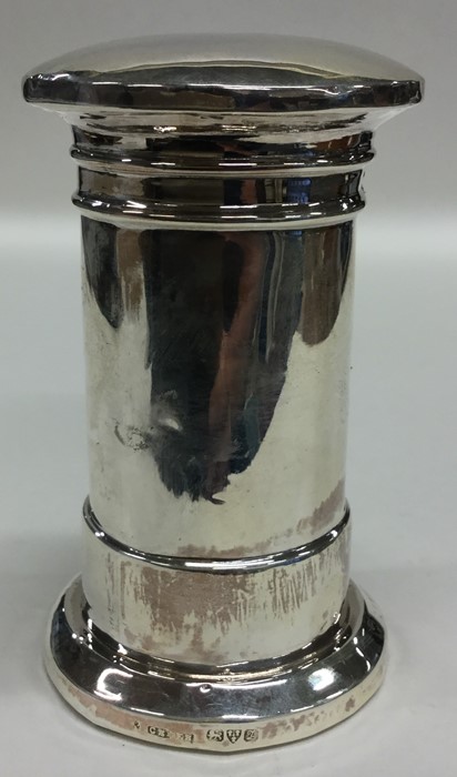 An unusual silver money box in the form of a lette