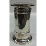 An unusual silver money box in the form of a lette