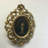 An oval gilt framed oil on canvas depicting The Vi