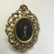 An oval gilt framed oil on canvas depicting The Vi