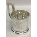 A Russian silver cup holder decorated with flowers