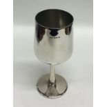 A heavy silver tapering goblet, bearing import mar