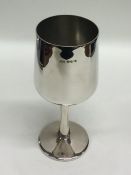 A heavy silver tapering goblet, bearing import mar