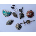 A collection of silver and enamel brooches, cuffli