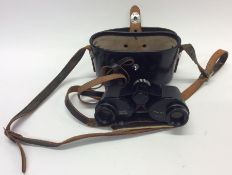 A pair of cased Mirador Super binoculars. Est. £20