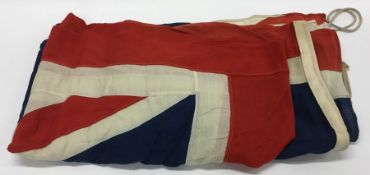 A large Union Flag. Approx. 210 cms x 100 cms. Est