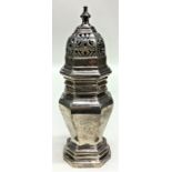 A George I style silver caster on pedestal base wi