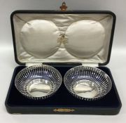 A boxed pair of silver bon bon dishes. Birmingham