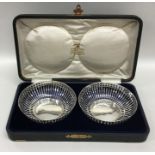 A boxed pair of silver bon bon dishes. Birmingham