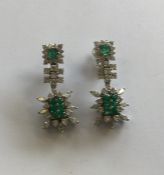 A good pair of emerald and diamond cocktail earrin
