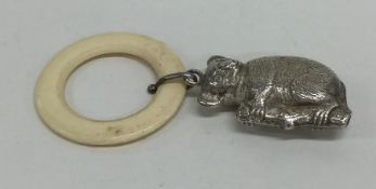 A novelty silver rattle in the form of an Australi