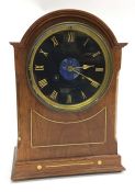 A good mahogany wall clock with black dial and bra