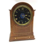 A good mahogany wall clock with black dial and bra