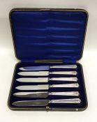 A boxed set of six silver mounted tea knives. Shef