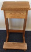 An oak panelled lectern on shaped base. Est. £15 -