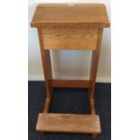 An oak panelled lectern on shaped base. Est. £15 -