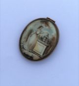 A good Georgian oval miniature of a lady in gilt f