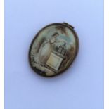 A good Georgian oval miniature of a lady in gilt f