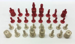 A good carved ivory chess set of typical form in m