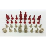 A good carved ivory chess set of typical form in m