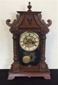 A Continental mahogany mantle clock.
