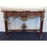 A Continental marble top hall table carved with sw