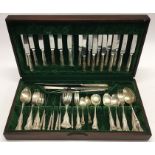 An old Kings' pattern plated cutlery set within a