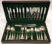 An old Kings' pattern plated cutlery set within a