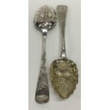 A pair of good quality silver berry spoons. London