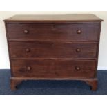 A mahogany chest of three drawers on bracket feet.