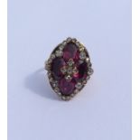 An attractive almandine garnet and rose diamond cl