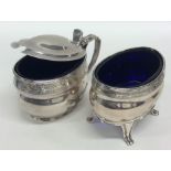 A good quality Edwardian silver two piece cruet se