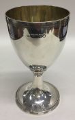 A good Georgian bright cut silver goblet with cres