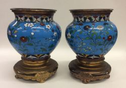 A pair of mid 19th Century cloisonné vases decorat